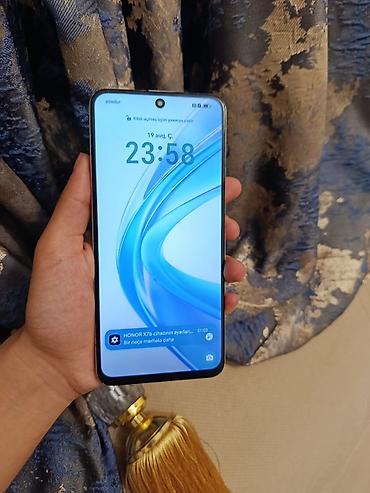 honor pad x9a: Honor X7a, 128 GB, rəng - Göy, Sensor, İki sim kartlı — 2