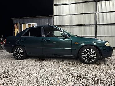 мини электро: Mazda 323: 2000 г., 1.3 л, Механика, Бензин, Седан — 7