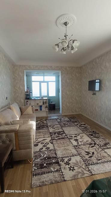 Mənzillər: Bakıxanov qəs., 2 otaqlı, Yeni tikili, 45 kv. m — 1