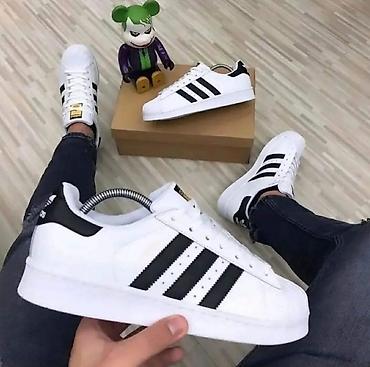 patike yeezy: Sportske patike – klasičan “shell toe” model sa tri pruge - Dizajn — 2