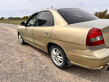 нур мото: Daewoo Nubira: 1999 г., 1.6 л, Механика, Бензин, Седан — 2