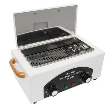 tutacaqlı xodunkalar: Ağ rəngli yüksək temperaturlu sterilizator, metal gövdəli və taxta