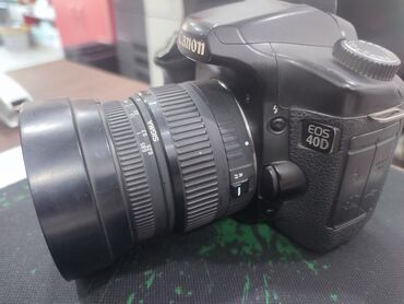 Фотоаппараты: Цифровая зеркальная камера Canon EOS 40D с объективом Sigma. Камера