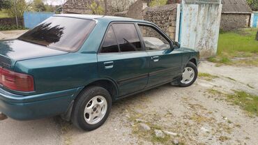 Mazda: Mazda 323: 1.6 l | 1994 il Sedan — 4