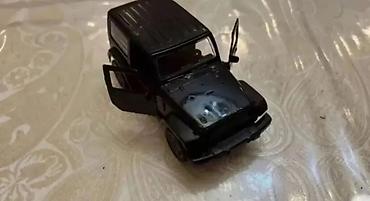 jeep wj: Qara rəngli oyuncaq off-road jeep modeli - Material: metal korpus — 4