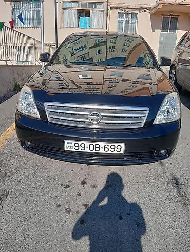 Транспорт: Nissan Teana – qara rəngli, geniş və komfortlu sedan. Xüsusiyyətlər — 1