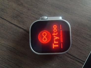 Smart saatlar: Ağ rəngli korpusa malik Watch Ultra modeli ağıllı saat. Saatın korpusu — 5