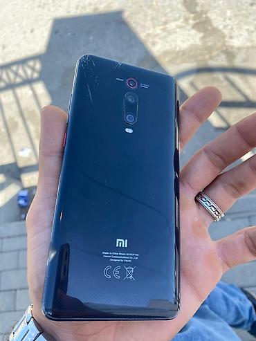 телефон fly fs502 cirrus 1: Xiaomi Mi 9T, цвет - Черный, 
 Отпечаток пальца — 3