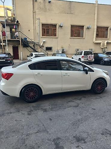 kredit vaz 2106: Kia Rio: 1.4 l | 2012 il Sedan — 8