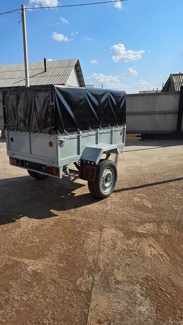 Qoşqular: Yük qoşqusu – tək oxlu, yanları hündür, karkaslı və brezent örtüklü - — 3