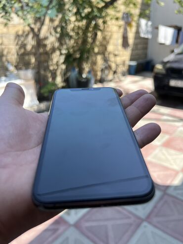 isdenmis soyuducu: IPhone Xs, 64 GB, Qara, Face ID