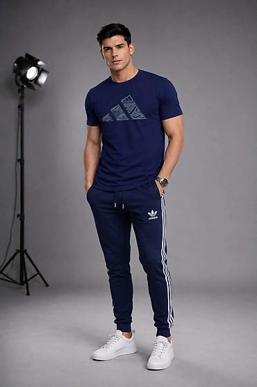 puma jam: Muška Adidas sportska kombinacija: majica i donji deo trenerke. - — 1