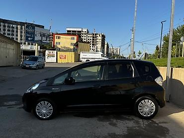 xundai solaris: Honda Fit: 2013 г., 1.3 л, Вариатор, Гибрид, Хэтчбэк — 5