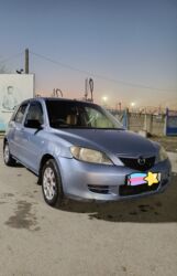 обмен машинами с доплатой: Mazda Demio: 2003 г., 1.3 л, Автомат, Бензин, Хетчбек