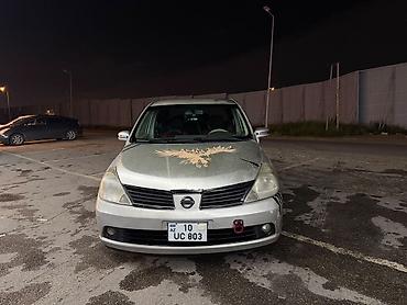 masin zapi: Nissan Tiida sedan – fərqli dizaynlı şəhər avtomobili 1,6 mator — 1