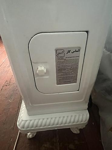 kamin dekor: Qaz sobası/kamin tipli isidici - Brend/model etiketi: “Almas Gaz” — 3