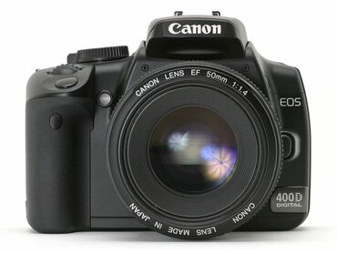 Фотоаппараты: Срочно продаётся фотоаппараты Саnon 400d Nikon3100