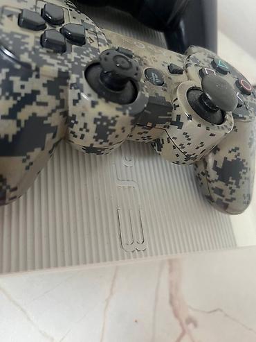 PS3 (Sony PlayStation 3): PlayStation 3 Super Slim (белая) Комплект: - Консоль PS3 Super Slim — 11