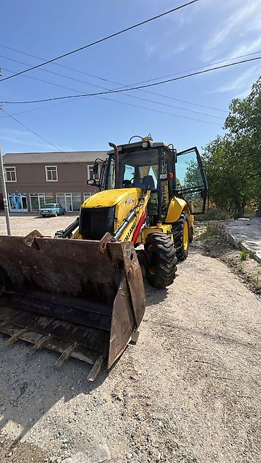 qubada traktor satisi: Satilir New Holland B90 — 3