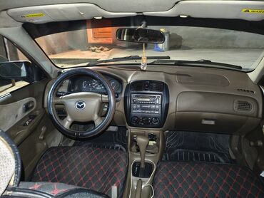 245 45 19 лето: Mazda 323: 2000 г., 1.8 л, Автомат, Газ, Седан