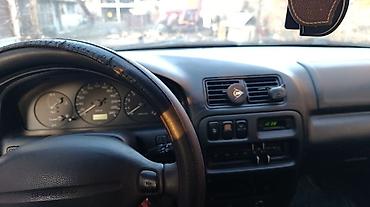 Mazda: Mazda 323: 1.5 l | 1996 г. Hečbek — 4