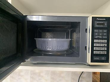 soba şüşəsi: Mikrodalğalı soba Panasonic, Ayrıca dayanan, Qril ilə, rəng - Qara, İşlənmiş — 1