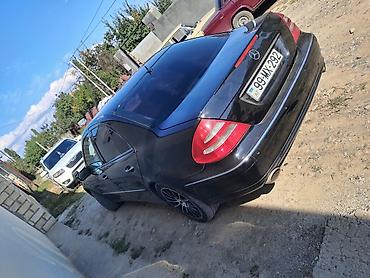 Mercedes-Benz: Mercedes-Benz E-Class sedan (W211) – qara rəng, 4 qapılı, arxa — 3