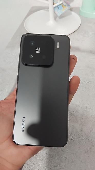 google 7: Xiaomi, 15, Б/у, 256 ГБ, цвет - Черный — 1