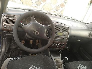 Другие автомобили: Просторный универсал синего цвета. Основные особенности: - Кузов — 7