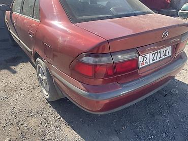 step wgn: Mazda 626: 1998 г., 2 л, Механика, Бензин, Седан — 4