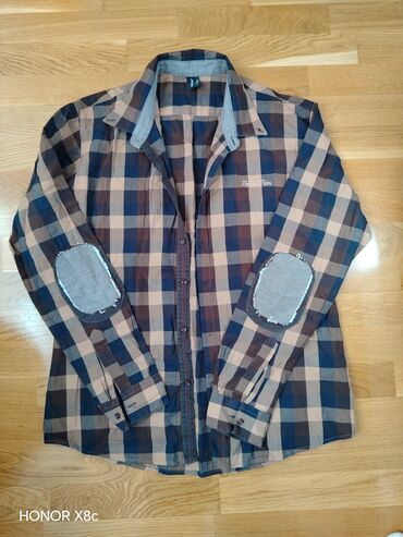 Košulje: Muska kosulja je kao nova. Velicina pise xxl, ali je neka L/XL — 10