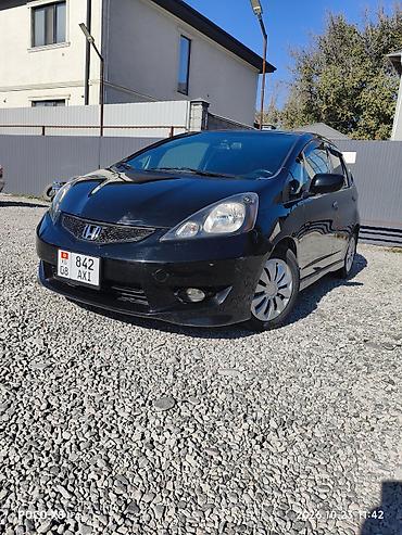 гранд хайлендер гибрид: Honda Fit: 2009 г., 1.5 л, Автомат, Бензин, Хэтчбэк — 1