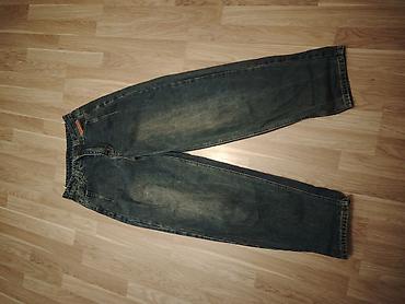 saatların satışı: Geniş kəsimli klassik cins şalvar - Material: qalın denim (mavi tünd — 1