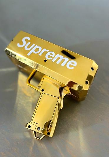 oyuncaq pul: Məhsul: Supreme qızılı “Money Gun” (pul atıcı) Təsvir: - Parlaq — 1