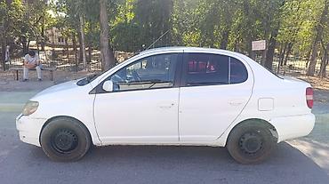 на тайоту: Toyota Platz: 2002 г., Седан — 3