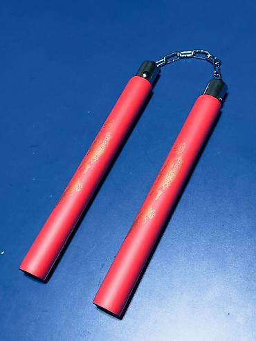 Другие тренажеры: Нунчаки тренировочные - Материал рукоятей: плотный вспененный/мягкий — 7