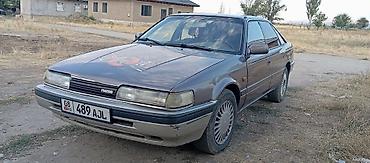 Транспорт: Mazda 626: 1992 г., 2 л, Механика, Бензин, Седан — 2
