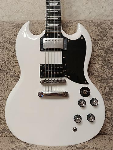 Гитары: Электрогитара gibson sg в белом цвете.Гитара полностью отстроенна — 6