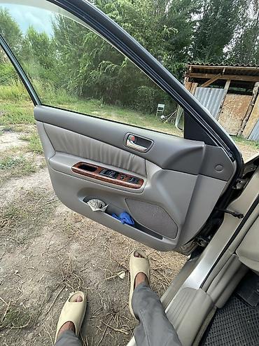 салон машины: Toyota Camry: 2003 г., 2.4 л, Автомат, Бензин, Седан — 10