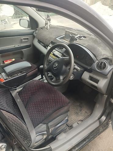 Mazda Demio: 2004 г., 1.5 л, Автомат, Бензин, Хэтчбэк