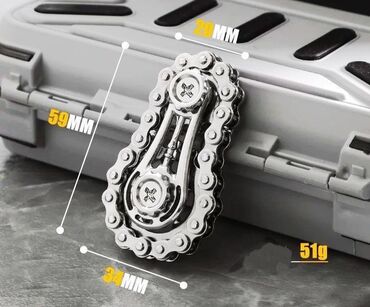 Игрушки: Небольшой спиннер из металла, выполненный в виде велосипедной цепи — 8