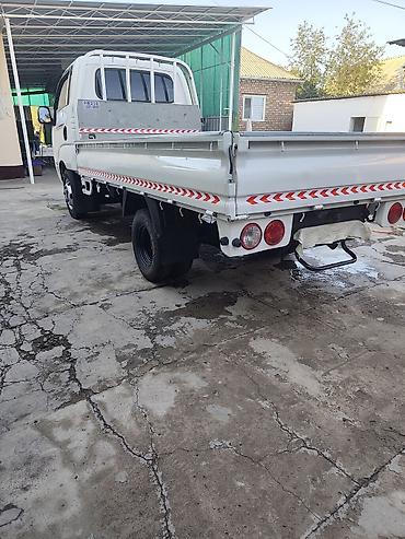 мини борт: Kia Bongo III, бортовой малотоннажный грузовик - Компоновка: кабина — 5