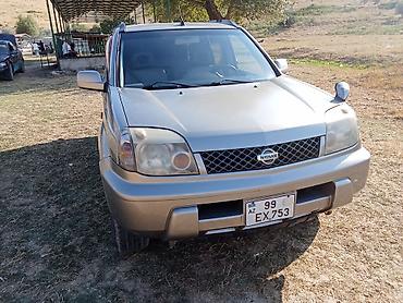 nissan note bufer: Nissan X-Trail (T30) – gümüşü rəngli, benzinlə çalışan kompakt SUV — 2