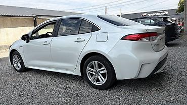 corolla 2016: Toyota Corolla: 2021 г., Гибрид, Седан — 2