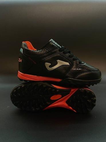 Бутсы: Сороконожки Joma белого цвета с синими вставками. Отлично подойдут — 10