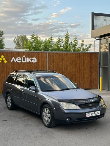 форт мондео универсал: Автомобиль Ford Mondeo в кузове универсал, выполненный в темно-сером