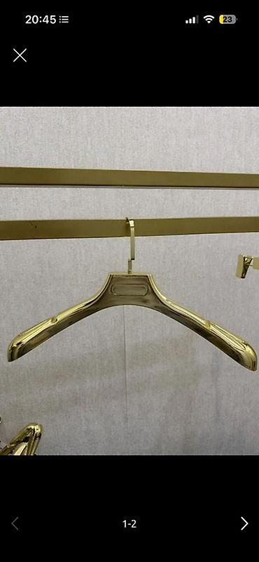 asılqan paltar üçün: Metal qızılı rəngdə asılqan - Material: metal, parlaq qızılı örtük - — 1