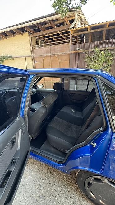 зонтик авто: Daewoo Nexia: 2011 г., 1.6 л, Механика, Бензин, Седан — 5