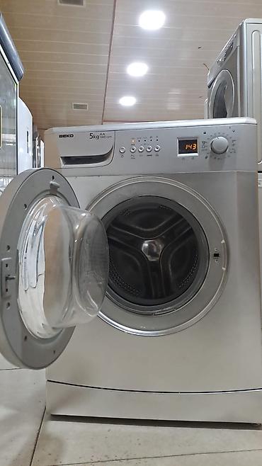 hamam kranti: Beko önyükləməli paltaryuyan maşın - Yük həcmi: 5 kq - Enerji sinfi — 2