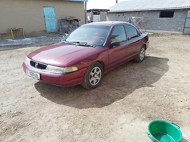 мото каракол: Ford : 1995 г., 2 л, Кол менен иштөөчү, Бензин, Седан — 4